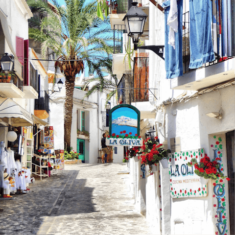 Explore the charming cobbled alleyways and backstreets of Ibiza's charming Old Town, 5km away