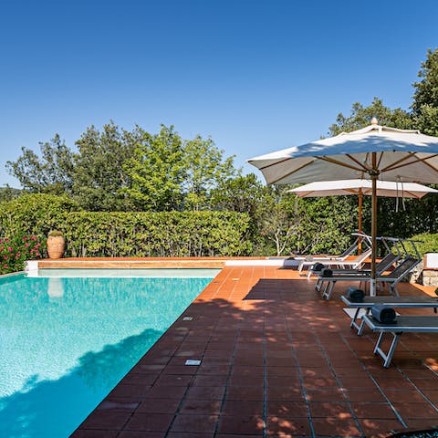 Soak up the sun before taking a dip in the private pool