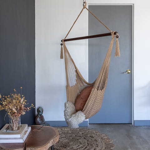Read a book in the cosy swing seat