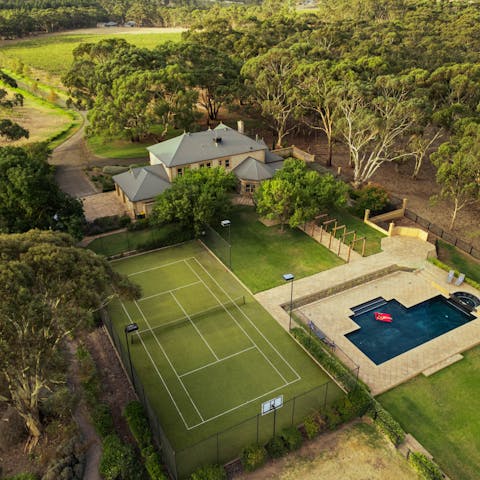 Play a game of tennis on the private court