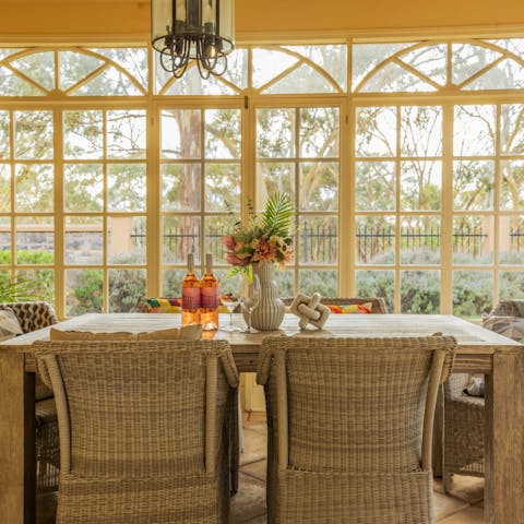 Open a bottle of local wine to enjoy in the sunroom