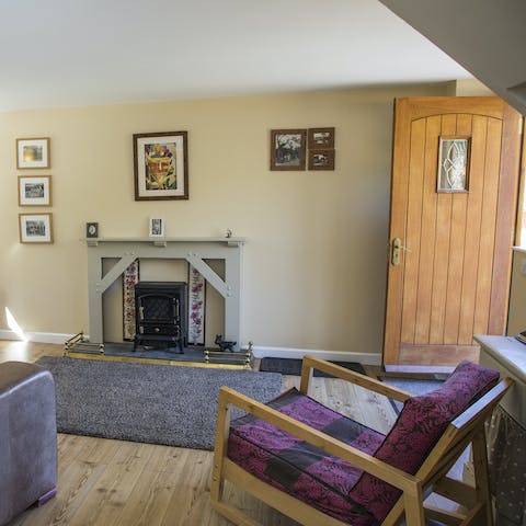 Settle down in front of your cosy fire after a day out exploring the local area