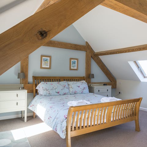 Wake under beautiful wooden beams in your charming cottage