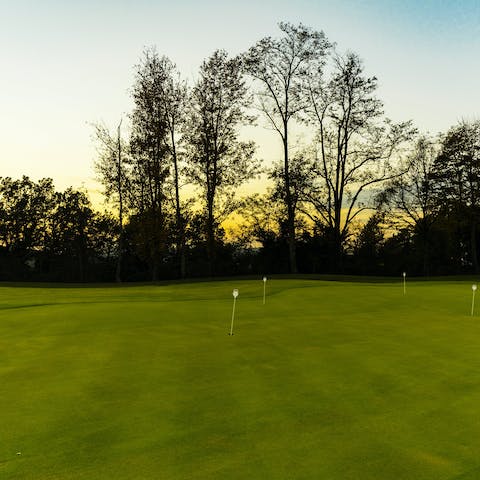 Practice your swing and tee off the resort's golf course