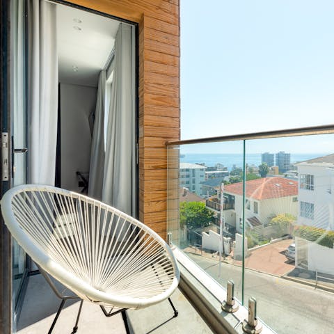 Admire ocean views from your private glass fronted balcony