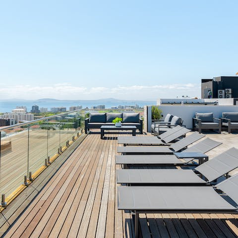 Laze on loungers in the sun and enjoy epic panoramic views of Table Mountain, Sea Point and the awesome Atlantic Ocean