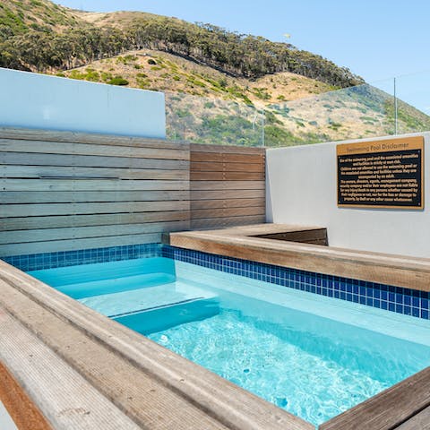 Cool off with a dip in the rooftop communal pool