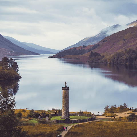 Visit the Glenfinnan Monument, a twenty-two-minute walk or two-minute drive away