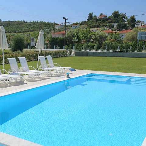 Spend afternoons hanging out by the private swimming pool