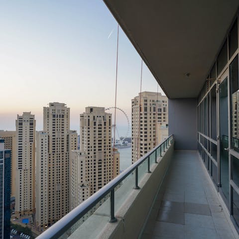 Greet the morning or admire the sunset from the private balcony offering panoramic city views