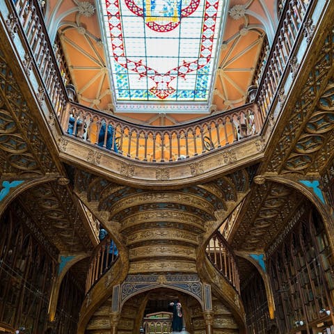 Visit the stunning Livraria Lello bookshop, a short walk away