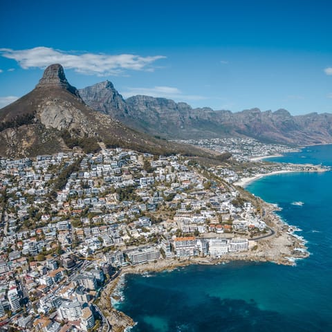 Explore the beauty of Cape Town with the seafront and landmarks like Table Mountain just a short drive away