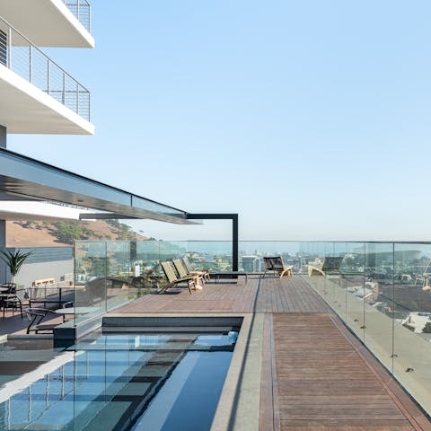 Go for a dip in the rooftop pool or relax in one of the sun loungers with stunning views