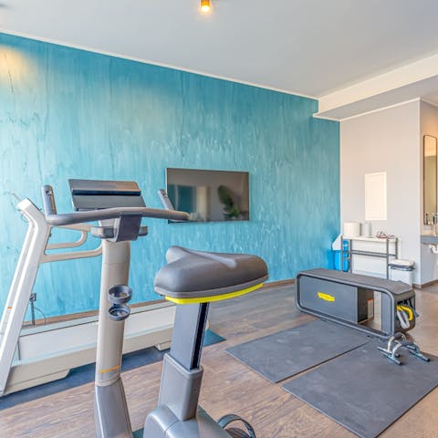 Keep on top of your fitness routine in the on-site gym 