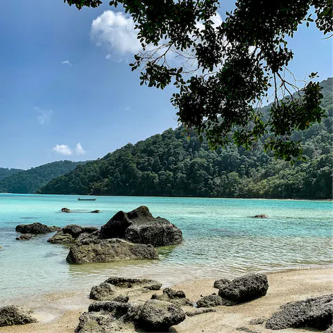 Paddle the crystal clear waters of Surin Beach, a short walk away