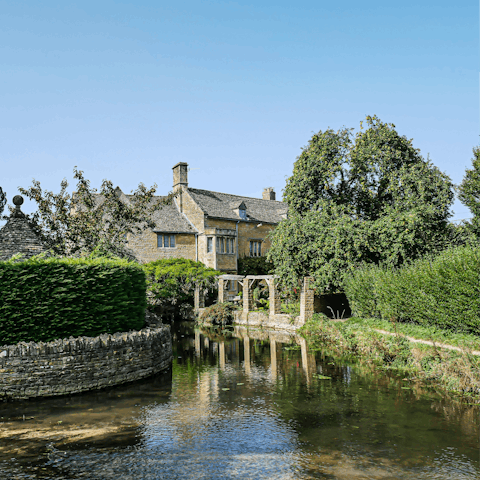 Visit the quaint town of Bourton-on-the-Water, twenty-two minutes away by car