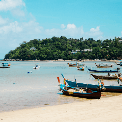 Spend the day on Bangrak Beach opposite this apartment