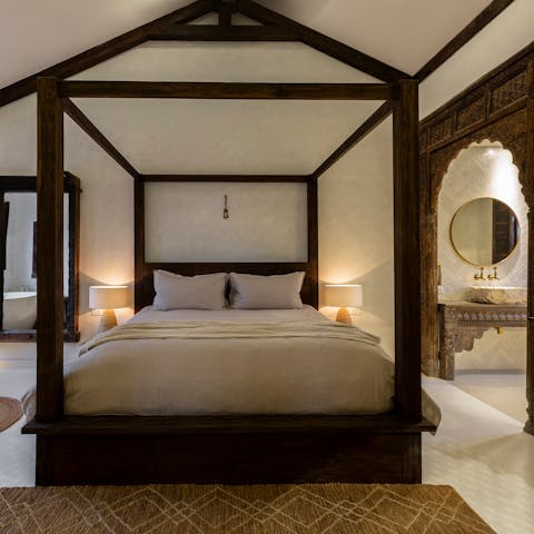 Get some rest in the four-poster bed after the perfect day in Koh Samui 