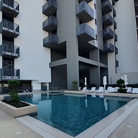 Sunbathe by the pool before staying on-site for a communal barbecue