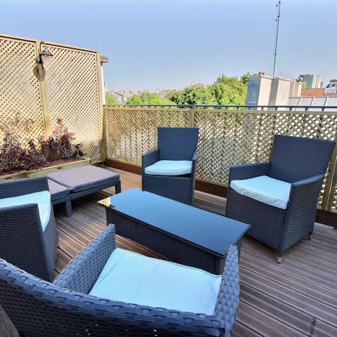 Spend evenings on the rooftop terrace with a glass of wine