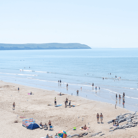 Spend sunny summer days at the beach, just a five-minute walk from home