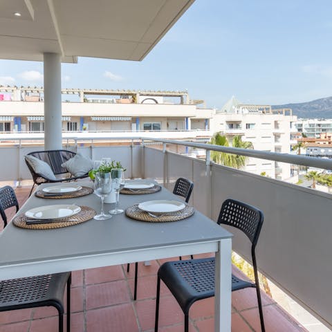Share beautiful meals on the balcony with views across the mountains