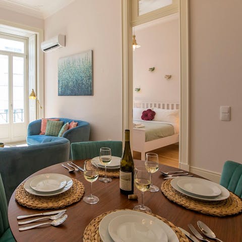 Enjoy a classy dinner in scalloped velvet chairs