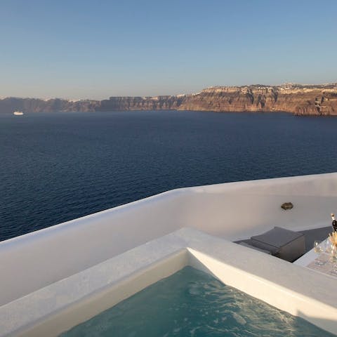 Enjoy the incredible bay view as you relax in the hot tub