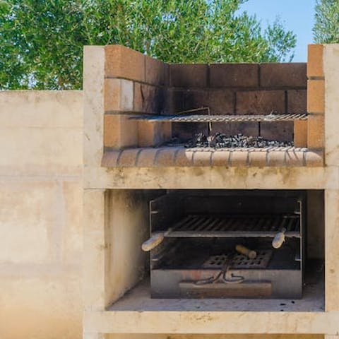 Grill some fresh fish on the stone-built barbecue for a wholesome lunch