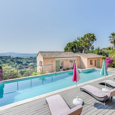 Find peace and relaxation while lounging by the private pool