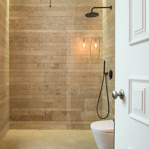 Pamper yourself in the spa-like bathrooms with their rainfall showers