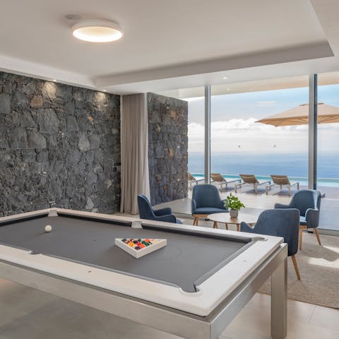 Play a game of pool in the cool, contemporary living area