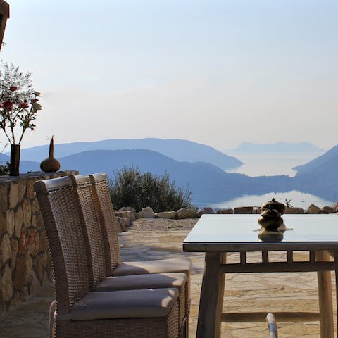 Enjoy an alfresco dinner on the terrace and admire the Ionian Sea views as you dig in