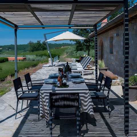 Take a seat at the dining table and enjoy your supper in the fresh air