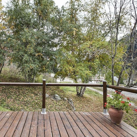 Enjoy a breath of mountain-fresh air on the deck outside