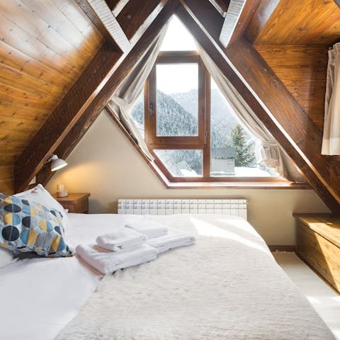 Wake up to mountain views in the master bedroom