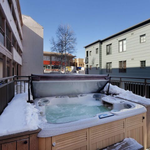 Enjoy a glass of wine in the community hot tub
