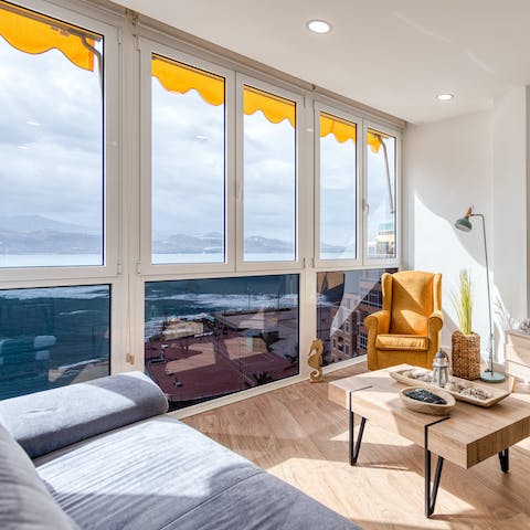 Chill out and admire the view of the rolling waves in the living area