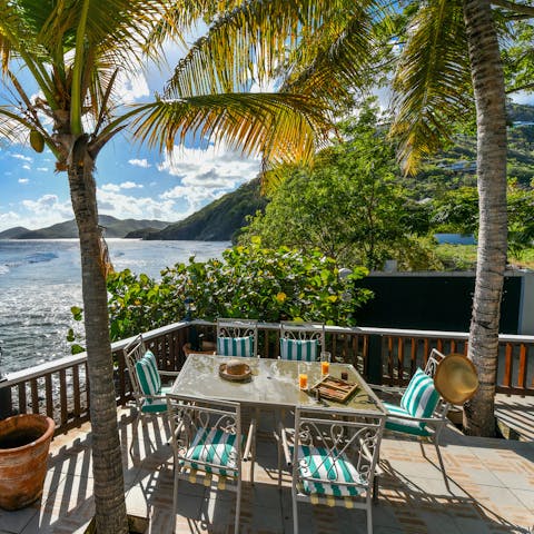 Dine by the ocean on the private terrace 