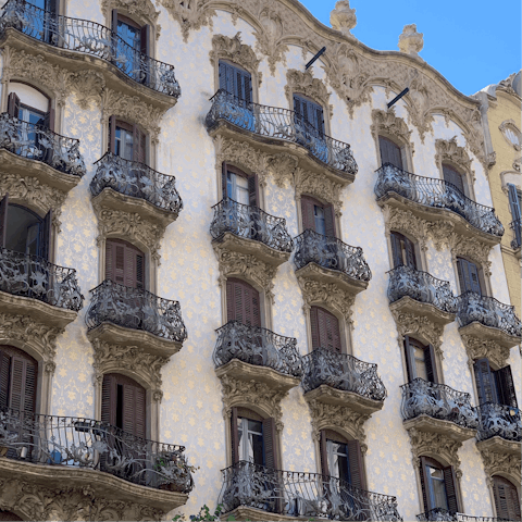 Gaze up at the various ornate apartment buildings around Eixample Esquerra