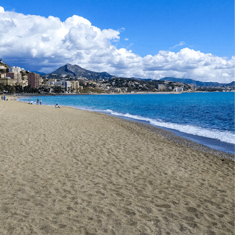 Spend the day on the golden sands of Playa de la Malagueta, 20 metres away