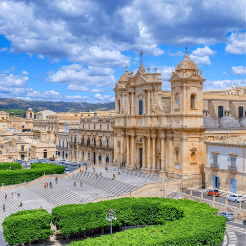 Admire the iconic Baroque-style Noto Cathedral, a short walk away
