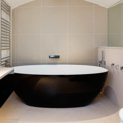 Soak in the deep monochrome bathtub