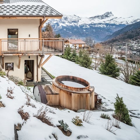 Embrace the magic of outdoor living from the warmth of the hot tub