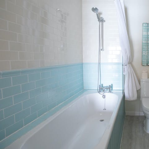 Relax and unwind in one of the home's bathtubs