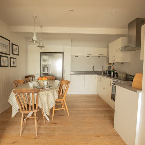 Enjoy family meals in the open plan kitchen and dining area