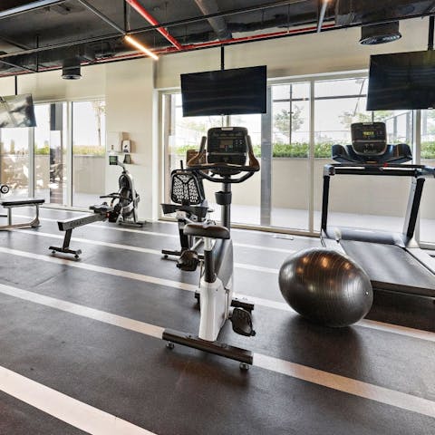 Keep on top of your fitness routine at the building's gym
