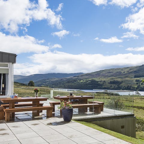 Have your morning coffee on the patio overlooking beautiful Loch Tay