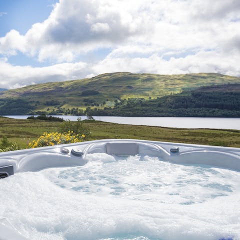 Unwind and enjoy the views from the outdoor hot tub