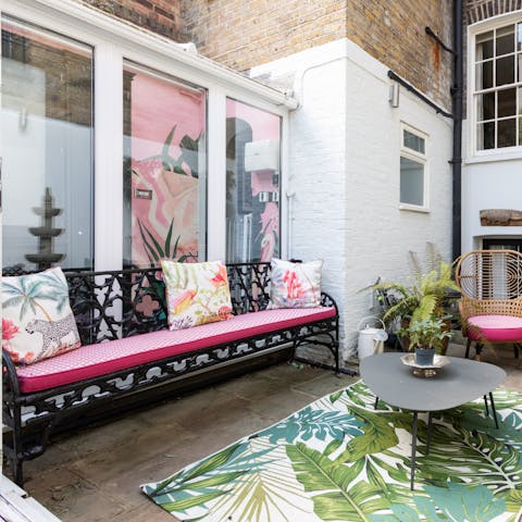 Relax with a glass of English fizz on the private patio